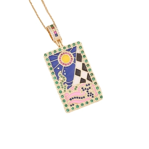 18K gold tarot card necklace featuring sun, chessboard, and enamel waves pendant