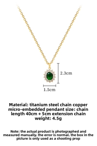 Detail showing an oval green gemstone pendant with micro-pave crystals on a gold chain