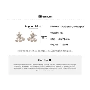 Dettagli orecchini a stella con perle e zirconi incluse misure 1,8 cm per 1,5 cm