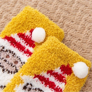 Thick warm coral fleece socks with cute pompoms for winter house wear in multiple colors