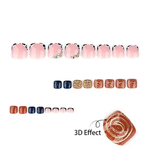 3D press-on toenails with gold glitter, blue rhinestones and cow print designs