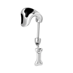 Silver titanium steel puppy ear stud with black dots and a dangling bone charm