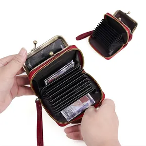 Red lychee pattern leather card holder with accordion slots and zipper coin pocket