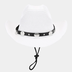Close-up of white straw cowboy hat featuring black leather band and silver flower studs