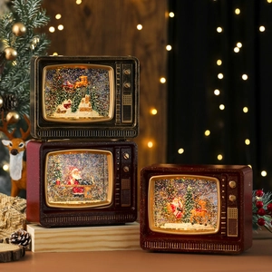 Retro Christmas TV snow globe lanterns with Santa and reindeer scenes in warm LED light