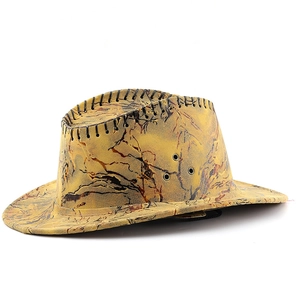 Detailed macro view of camo pattern western cowboy hat with side metal eyelets