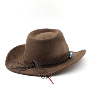 Detailed macro view of brown faux suede cowboy hat featuring turquoise beads and cord