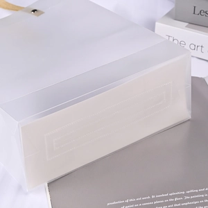 Transparent frosted PP gift bag with sturdy white base and brown handles for wedding favors