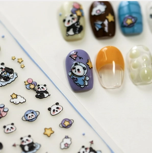 Detail of 3D panda nail stickers with cute astronaut and starry sky patterns for kids