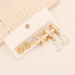Detailed set of gold stainless steel earrings with anchor, moon and zircon designs