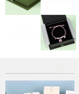 Detail of jewelry gift box with thickened sponge padding and pink charm bracelet