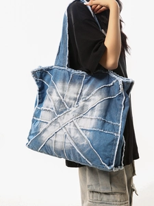 Retro washed blue denim tote bag with frayed patchwork design for women casual street style