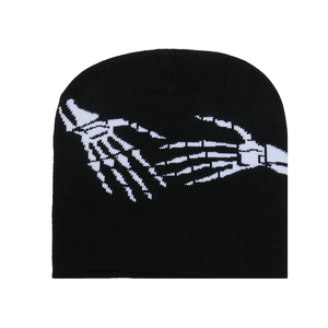 Bonnet en maille noire style hip hop avec motif jacquard de main de squelette blanc