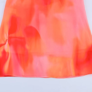 Floral print long scarf dress featuring vibrant orange-red gradient chiffon hem detail