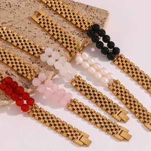 Detail of vintage 13mm stainless steel watchband bracelets with colorful natural stone inlay