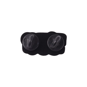 Back view of black matte alloy brooch with dual rubber pin backs and wavy edges