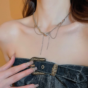 Chic silver layered star fringe necklace with crystal resin pendant on model