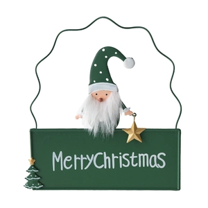 Christmas welcome metal sign with Santa Claus, miniature tree and Merry Christmas text