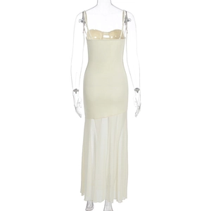 Detail of off-white summer dress featuring mesh splicing and asymmetric hemline