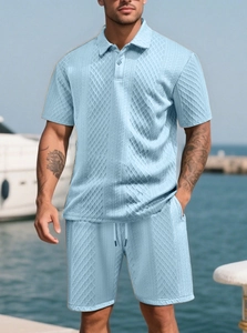 Detail of light blue waffle knit texture on men's summer short sleeve polo set