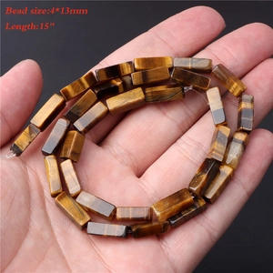 Close-up of 4x13mm tiger eye abacus beads for DIY jewelry making on 15-inch strand