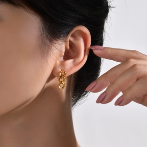 Fashionable gold triple-link chain earrings for women in polished stainless steel
