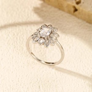 Luxurious S925 sterling silver ring with rectangular center stone and petal halo on stone