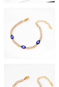 Detail of gold evil eye tennis bracelet with blue enamel and white cubic zirconia accents