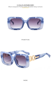 Close-up of blue leopard print frame sunglasses with gold interlocking hardware