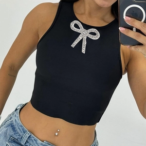 Black ribbed knit cropped tank top with silver rhinestone bow detail in mirror selfie