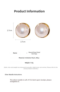 Detail view of 2.7cm round faux pearl earrings with golden alloy frame and silver needle