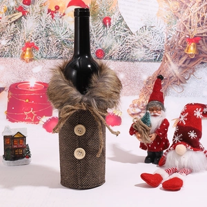 Detail of Christmas wine bottle cover in brown herringbone fabric with faux fur collar