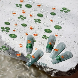 3D nail stickers featuring red goldfish and green lotus leaf patterns on matte nails