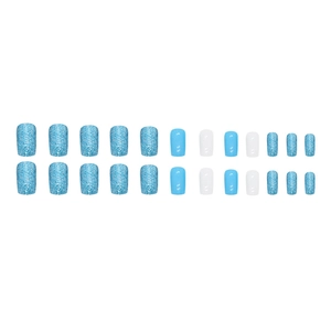 Medium square press-on nails featuring glitter blue, solid blue, and milky white designs