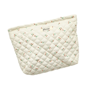 Quilted cotton cosmetic bag with cherry floral pattern and minimalist brand label