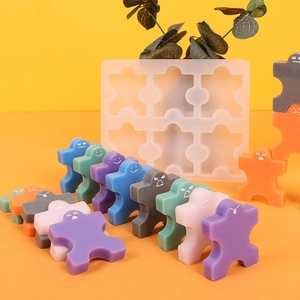Detail of 6-cavity silicone mold with colorful DIY resin human figures and facial expressions