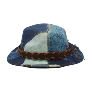 Detail of western patchwork denim fedora with brown braided leather band and bow knot