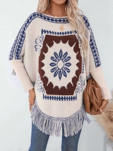 Bohemian knit poncho sweater with geometric floral patterns and tassel hem in beige