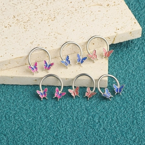 Set of 6 stainless steel butterfly nose hoops with pink and blue enamel wings