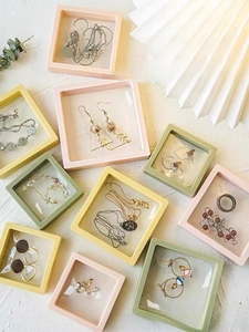 Macro detail of PE film jewelry organizers in macaron colors for dustproof storage