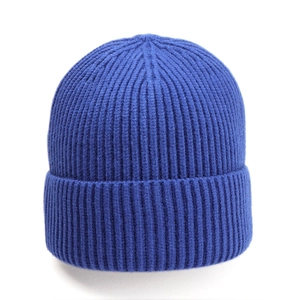 Detail of royal blue ribbed knit beanie showing thick texture and folded cuff style