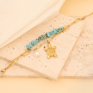 Double-layered stainless steel bracelet with golden turtle, pearl and turquoise stones