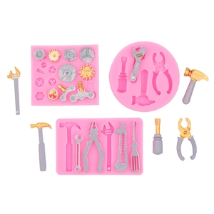 Kit de moldes de silicona rosa con formas de herramientas para decoración de fondant