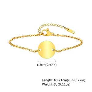 Detail showing gold stainless steel round charm with adjustable lobster clasp chain
