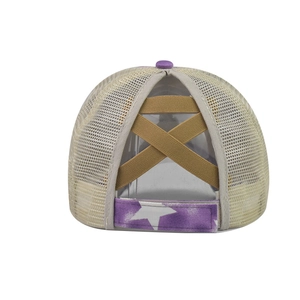 Detail of cross elastic bands for high ponytail on mesh back washed cotton baseball cap