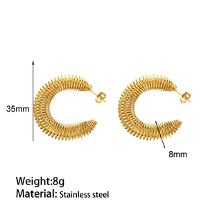 Detail of gold 18k plated stainless steel spring earrings showing 35mm diameter and 8g weight