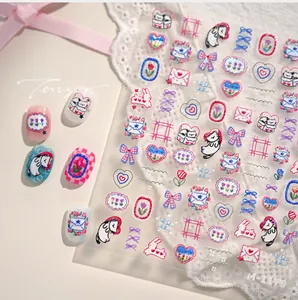 Detail view of M-1179 5D embossed cartoon nail stickers with cat and floral patterns