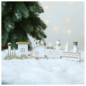 White and gold wooden Christmas train detail featuring snowmen and bears on a snowy base