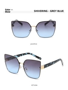 Front and 45-degree side view of grey blue gradient oversized cat eye sunglasses