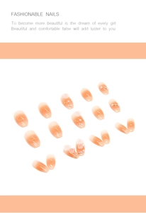 Macro detail of gradient press-on nails with 3D camellia flowers, pearls and rhinestones